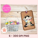Cow-themed Easter card with basket of eggs on a wooden background, featuring DIY paper crafts text.