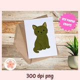 Card with green cat illustration on a wooden surface with 'DIY Paper Crafts' text.