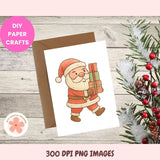 Christmas card with Santa Claus holding a gift, surrounded by festive decorations on a wooden surface.