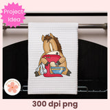 Towel with cartoon horse design hanging on an oven rack, featuring 'Project Idea' text.