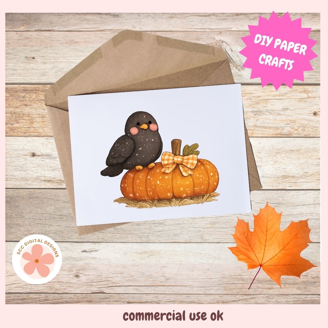 A square greeting card with a cute illustration of a dark gray bird perched on an orange pumpkin with a yellow bow, shown with a brown kraft envelope on a wood plank background. Pink promotional badges read 'DIY PAPER CRAFTS' and 'commercial use ok', with a small 'Eco Digital Designs' logo.