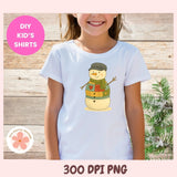 Child wearing a white t-shirt with a snowman design on a wooden background