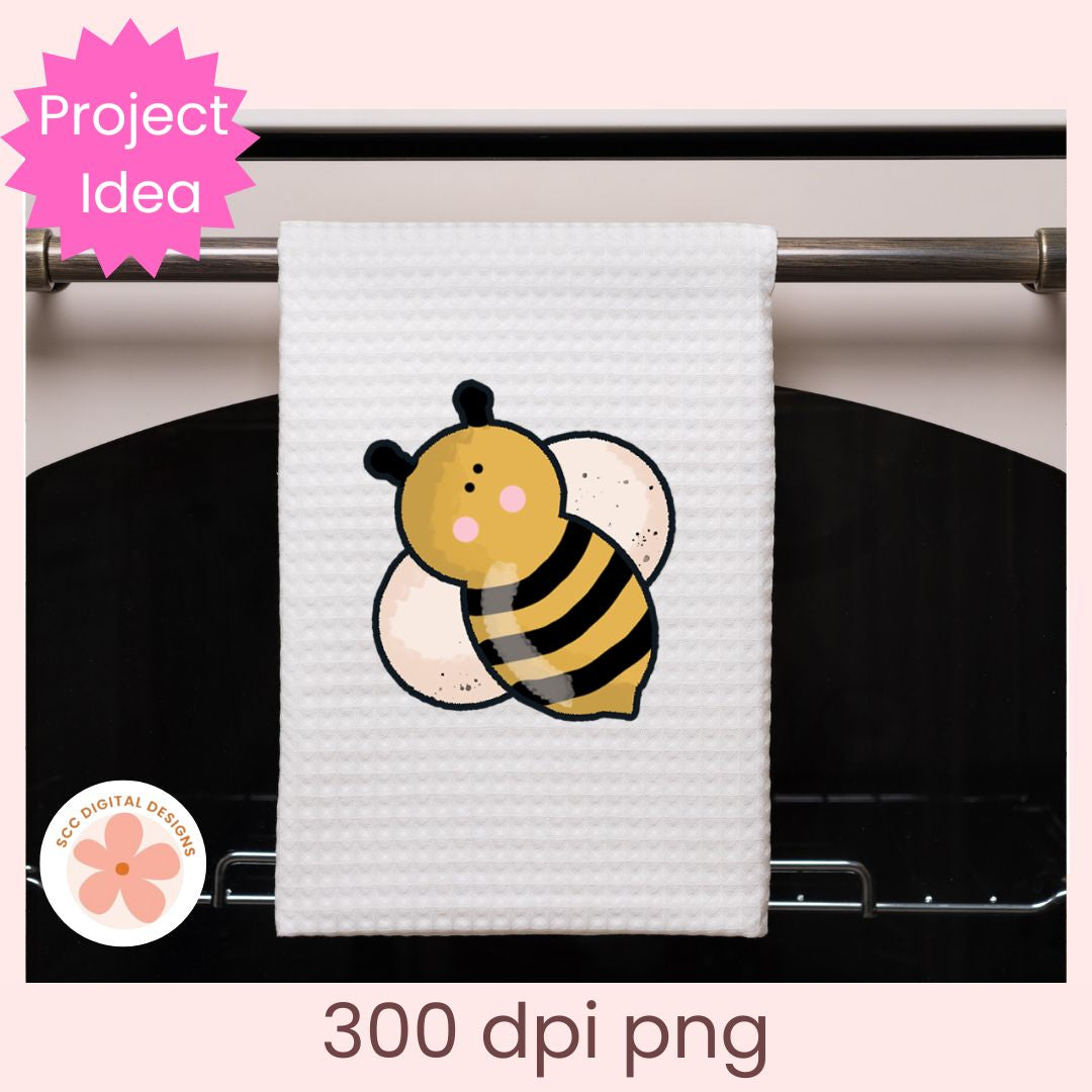 White towel with a bee design hanging on an oven rack, labeled 'Project Idea' with a pink star.