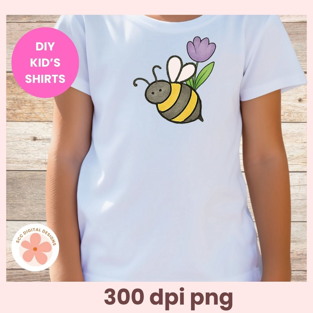 White t-shirt with a bee and flower design on a wooden surface, labeled 'DIY Kids' Shirts'.