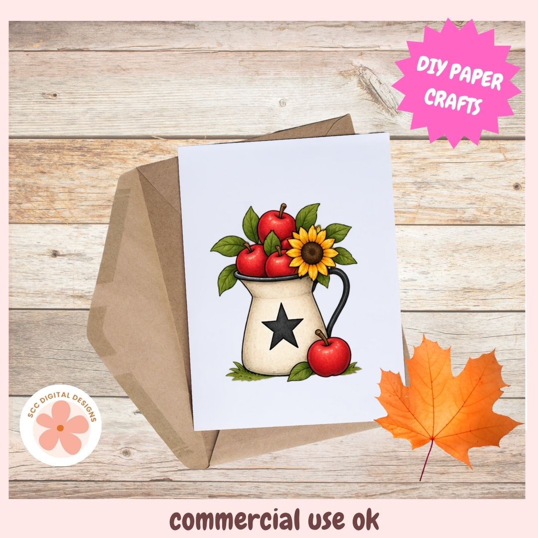 A printed card or art print featuring an autumn-themed illustration of red apples, a sunflower, and green leaves in a cream pitcher with a black star, shown with a brown envelope on a wood plank background. A pink starburst says 'DIY PAPER CRAFTS,' and the bottom text reads 'commercial use ok.