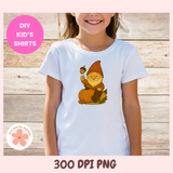Child wearing a white t-shirt with a cartoon gnome design on a wooden background