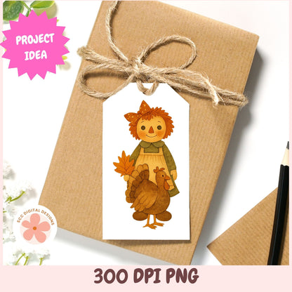 A kraft paper gift box tied with twine and a white gift tag featuring a cartoon raggedy cutout character holding a turkey, shown on a white background with decorative text and a pink 'PROJECT IDEA' badge.