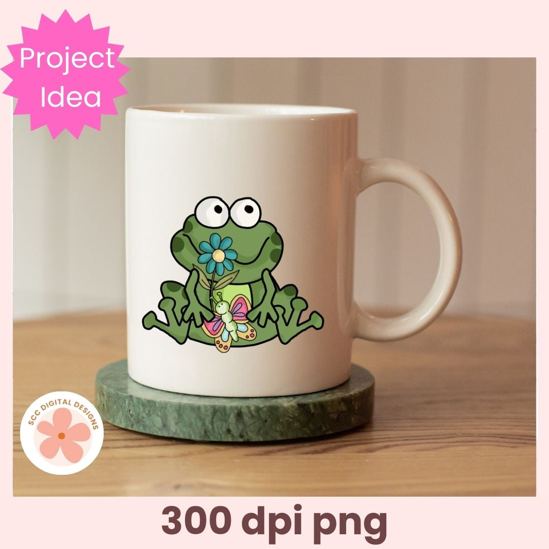 White mug with a cartoon frog design on a wooden surface, featuring 'Project Idea' text and '300 dpi png' text.