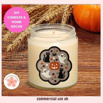 A Halloween-themed scented candle in a clear glass jar with cream-colored wax, featuring a decorative label with black cats, white ghosts, a jack-o'-lantern, and a spider on a wood background with wheat and a pumpkin.