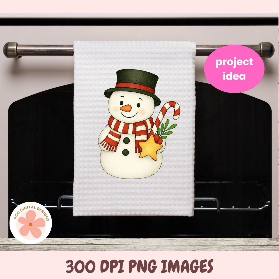 A white waffle-knit kitchen towel hanging on a metal oven rack, featuring a festive snowman design with a black top hat, red-and-white striped scarf, orange carrot nose, green pine sprig, and yellow star. The image includes a pink 'project idea' badge and a circular 'KCC DIGITAL DESIGNS' logo, with '300 DPI PNG IMAGES' text at the bottom.