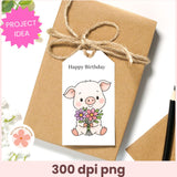 Gift box with a 'Happy Birthday' tag featuring a cartoon pig holding flowers, on a white background.