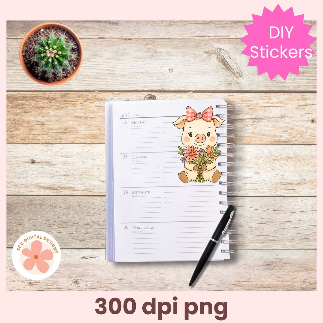 Notebook with a decorative sticker of a pig holding flowers on a wooden surface, with a pen and small plant.