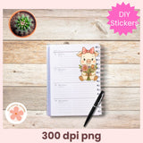 Notebook with a decorative sticker of a pig holding flowers on a wooden surface, with a pen and small plant.