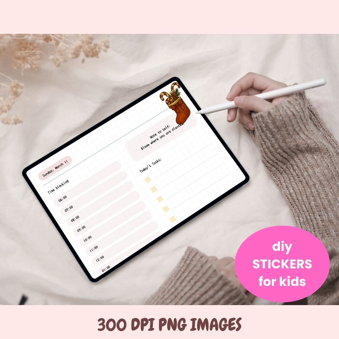 Person using a stylus on a tablet with a sticker, on a soft fabric background.