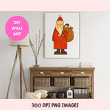 Framed illustration of a Santa Claus holding a child on a wall above a wooden console table.