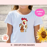 White t-shirt with a cartoon rooster holding a cupcake design, on a wooden background with a sunflower.