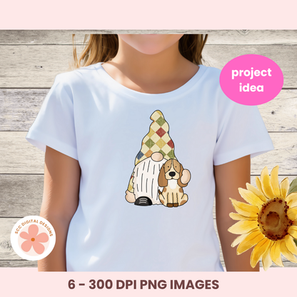 White t-shirt with a cartoon gnome and dog design on a wooden background
