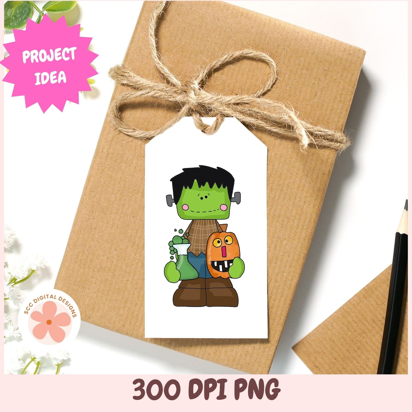 A Halloween-themed gift tag featuring a cartoon Frankenstein's monster holding a pumpkin, shown on a kraft paper wrapped package tied with twine. The image includes a pink 'PROJECT IDEA' badge, a '300 DPI PNG' text banner, and a 'ECOS DIGITAL DESIGN' logo.
