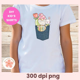 White t-shirt with a cartoon design of a gnome and rabbit in a pocket on a wooden background, labeled 'DIY Kids' Shirts'.