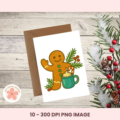 A Christmas-themed greeting card design shown on a white card with a brown envelope, placed on a light wood surface with pine branches and red berries. The card features a gingerbread person holding a green mug with hot chocolate and candy canes.