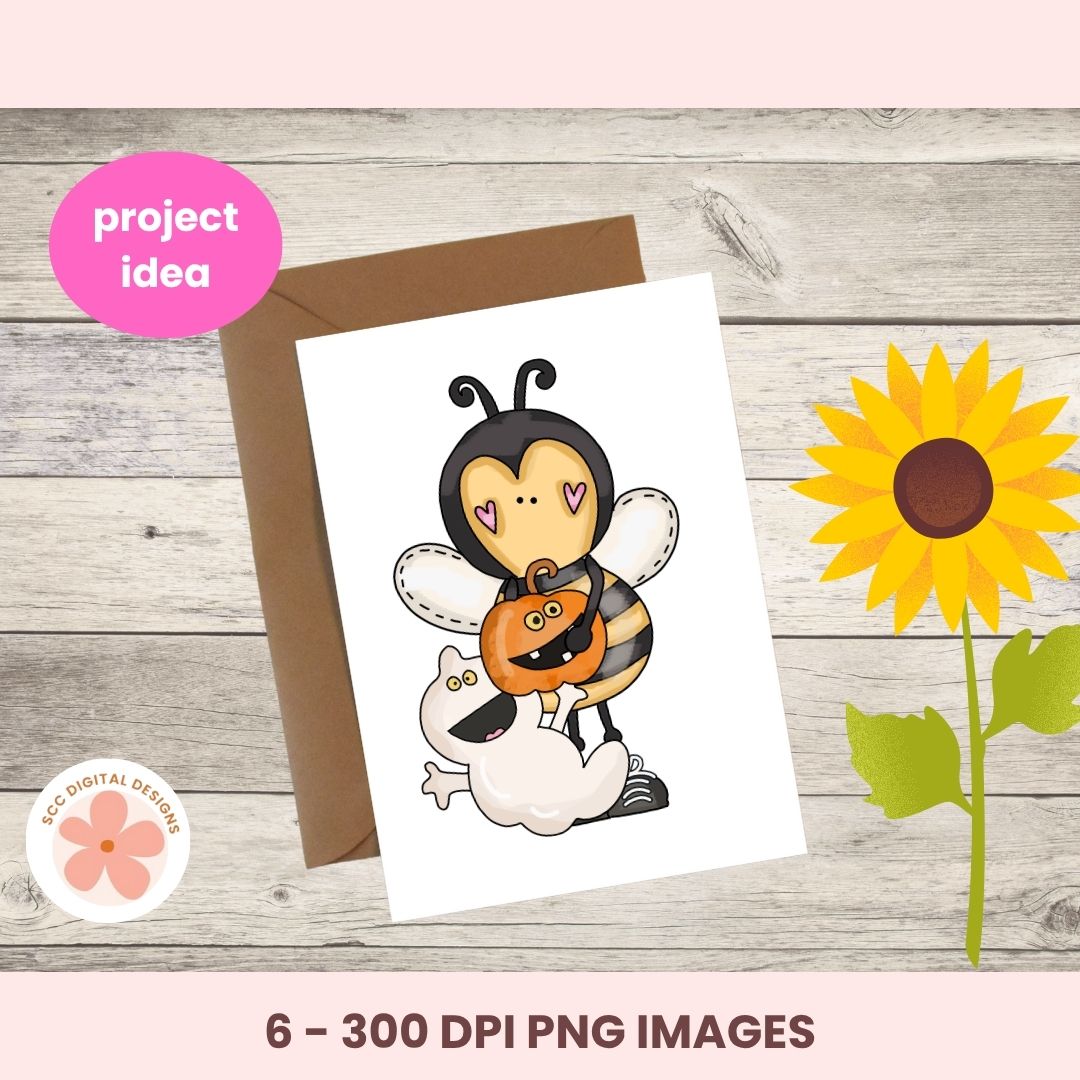 A digital preview of a printable card design showing a cute cartoon bee holding a jack-o'-lantern and a white cloud, placed on a kraft envelope over a wood background with a sunflower illustration. Text reads 'project idea' and '6 - 300 DPI PNG IMAGES'.
