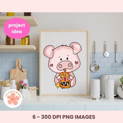 A framed cartoon pig illustration holding an orange pumpkin, displayed on a kitchen wall above a countertop. The image includes a pink 'project idea' badge and text reading '6 - 300 DPI PNG IMAGES' at the bottom, plus a circular '600 DIGITAL DOWNLOADS' badge at lower left.