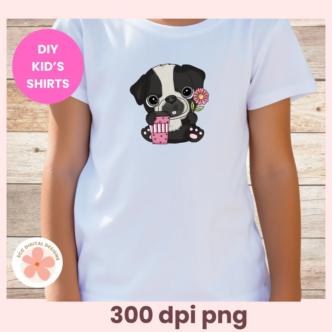 White t-shirt with a black and white dog graphic holding a pink cup on a wooden background, labeled 'DIY Kids' Shirts'.