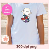 White t-shirt with a cartoon sheep holding a red box on a wooden background, labeled 'DIY Kids' Shirts'.