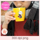 Person holding a yellow mug with a cartoon design, wearing a black scarf.