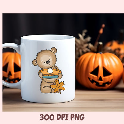 A white ceramic mug with a cute cartoon teddy bear holding a pumpkin pie graphic, set against a Halloween-themed background with pumpkins and a wooden surface. Text at the bottom reads '300 DPI PNG'.