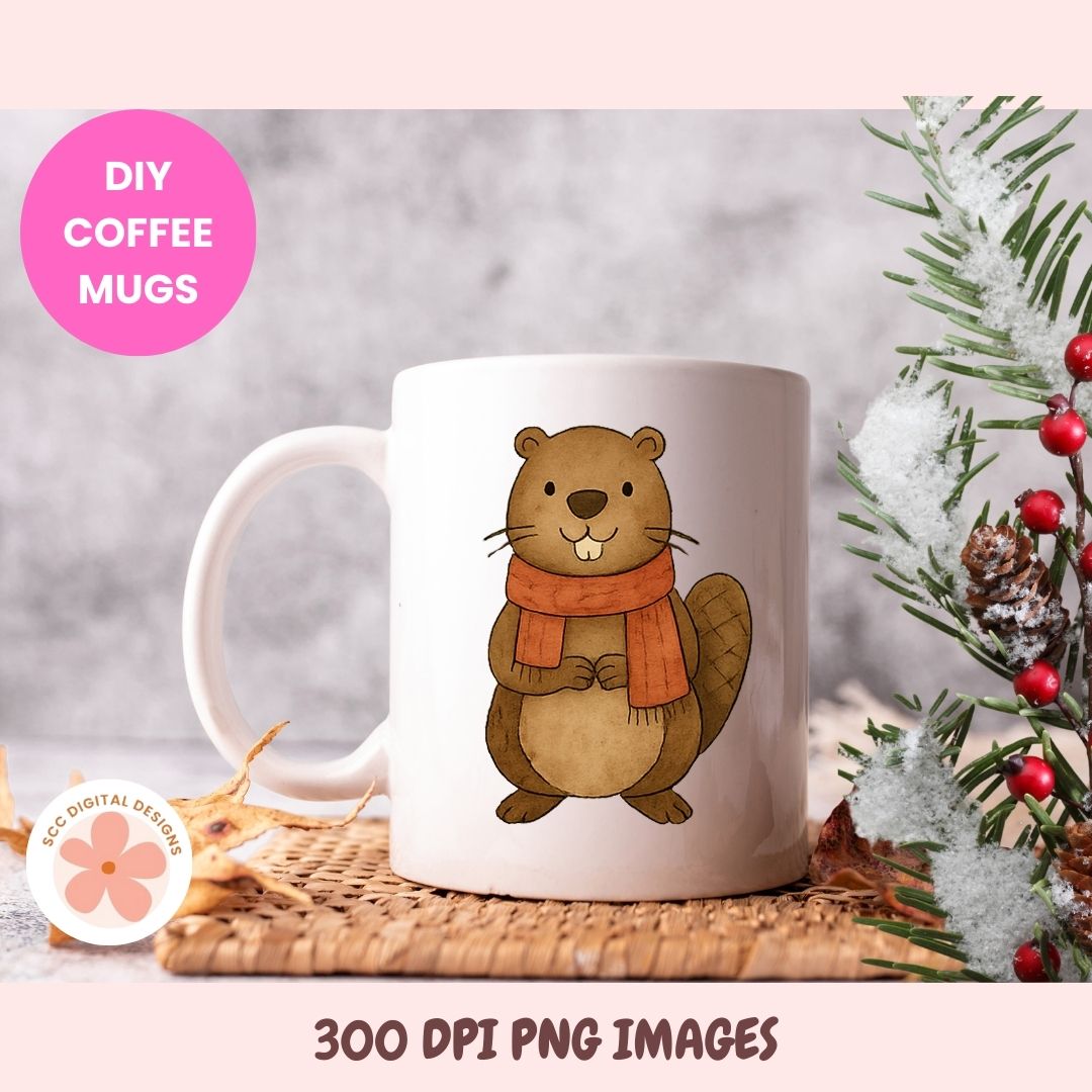 A white ceramic coffee mug with a cartoon beaver wearing an orange scarf, displayed on a woven mat with holiday greenery and a pink 'DIY COFFEE MUGS' badge.