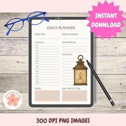 A digital daily planner printable shown on a tablet screen, styled on a light wood background with blue glasses, a black stylus, and a pink 'INSTANT DOWNLOAD' badge. The planner includes sections for wake time, today's mantra, schedule, to-do list, memo, and daily reflection, with a lantern illustration.