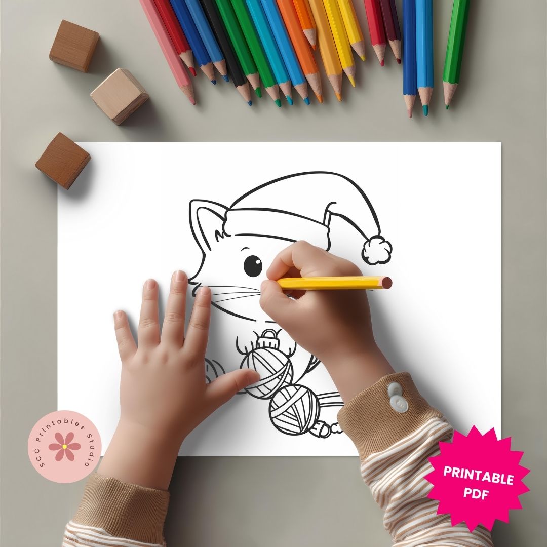 Coloring page with a cat and yarn design, hands holding a pencil, and colorful crayons on a gray background.
