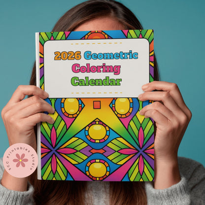 Person holding a 2026 Geometric Coloring Calendar with colorful patterns on a teal background