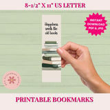 Hand holding a printed bookmark with text on a light green background, featuring branding and product details.