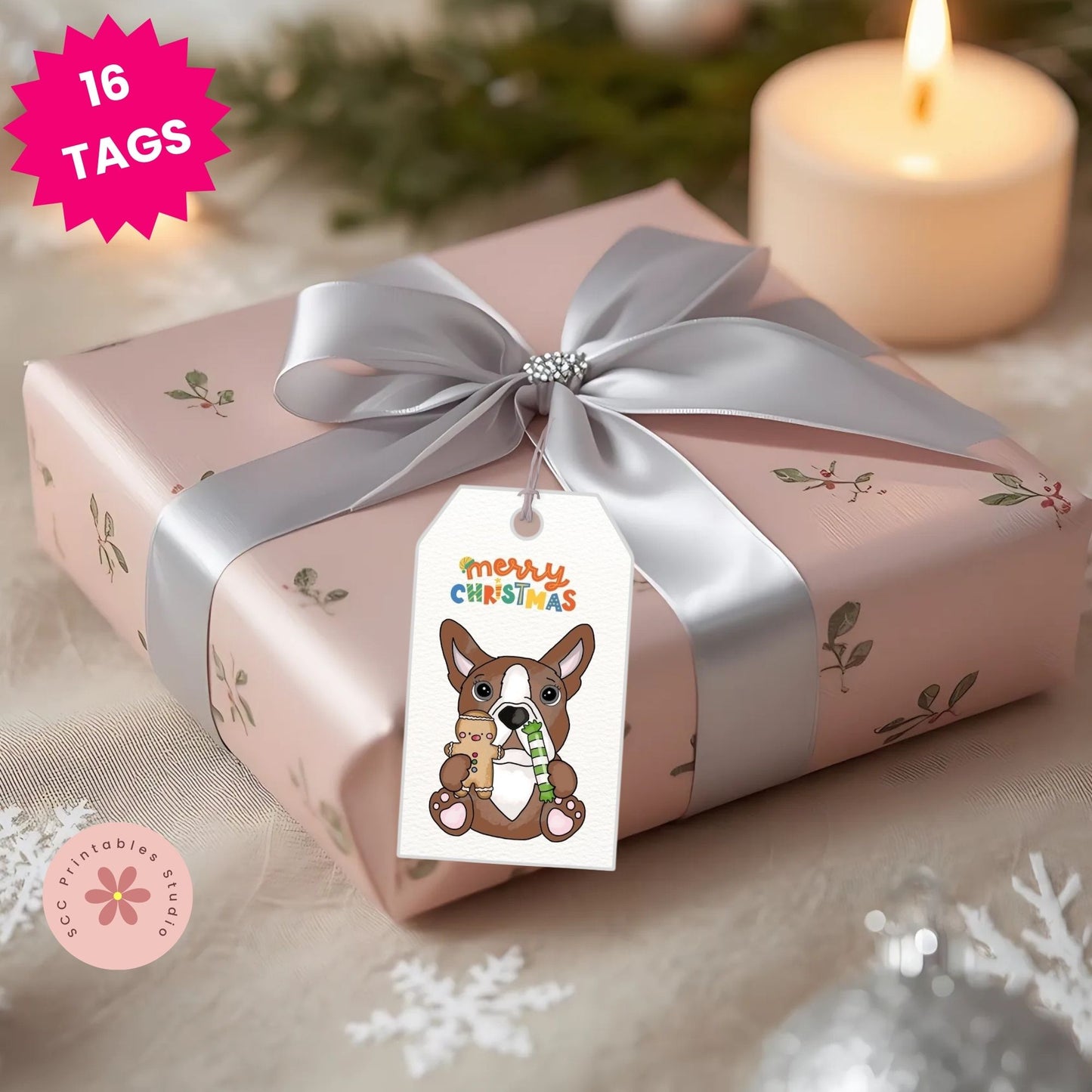 Gift wrapped in pink paper with a silver ribbon and a 'Merry Christmas' tag featuring a dog illustration, set against a festive background with a candle and snowflakes.