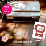 Printer on a wooden surface with a printed card and scissors, featuring 'Print at Home' and 'Commercial Use OK' text.