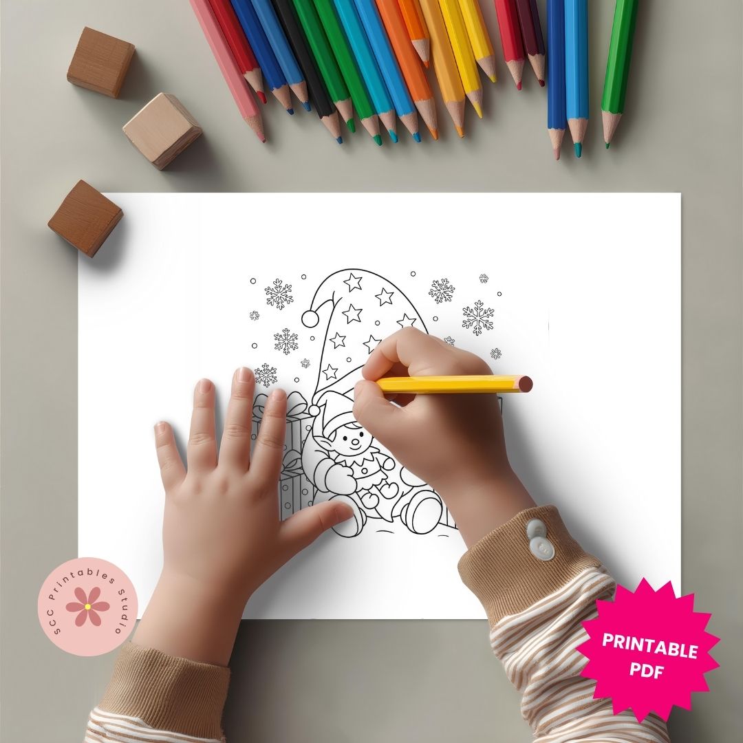Child coloring a winter scene with colored pencils on a gray surface.