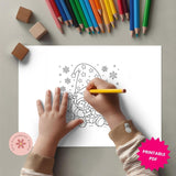 Child coloring a winter scene with colored pencils on a gray surface.