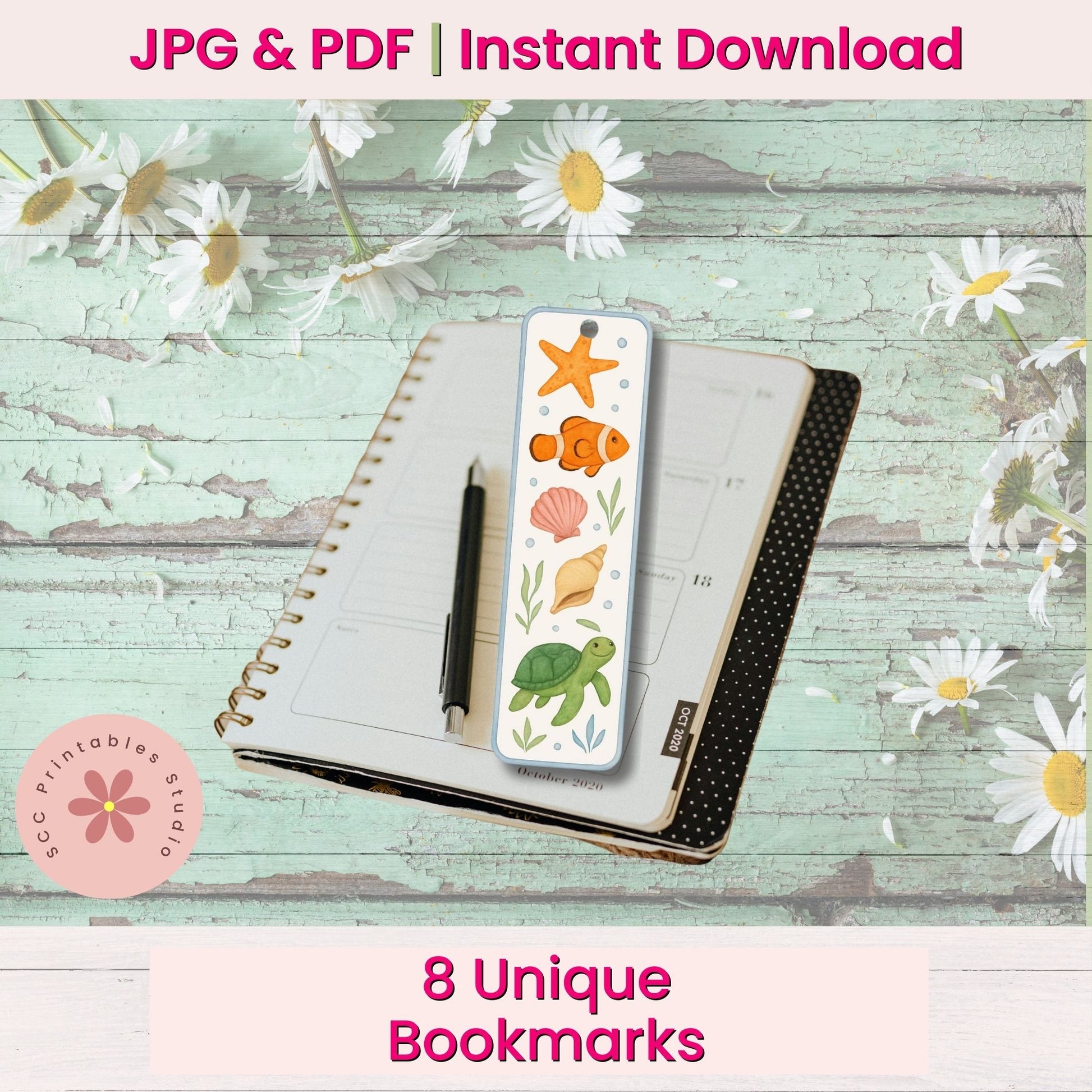 Bookmarks with ocean-themed designs on a notebook with flowers in the background