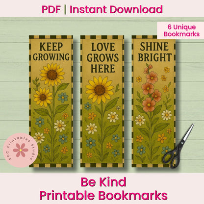 Three printable bookmark designs displayed on a light wood background, with decorative text reading 'KEEP GROWING', 'LOVE GROWS HERE', and 'SHINE BRIGHT'. The image includes promotional text 'PDF | Instant Download', 'Be Kind Printable Bookmarks', '6 Unique Bookmarks', and a pink logo for 'SCC Printables Designs', plus a pair of scissors as a styling prop.