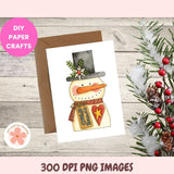 Card with a snowman design on a wooden surface with decorative elements.