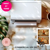 White printer on a desk with a cup, plant, and printed images of farm animals.