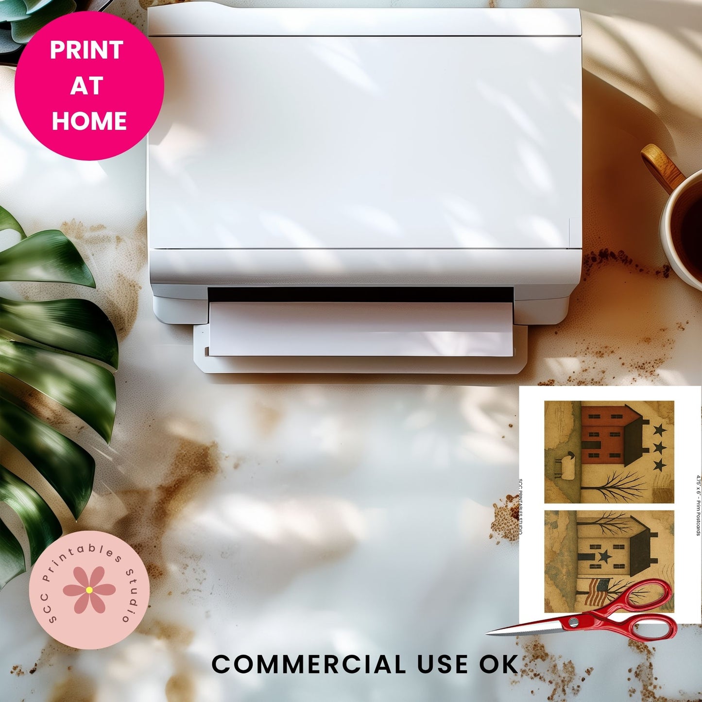 White printer on a desk with a cup of coffee, plant, and printed designs.