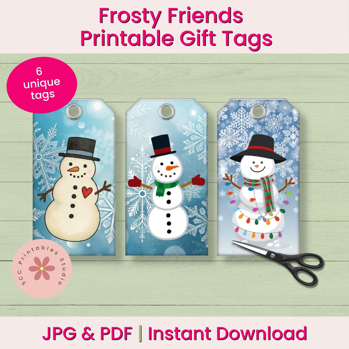 Three printable snowman gift tags on a light wood background with text reading 'Frosty Friends Printable Gift Tags,' '6 unique tags,' and 'JPG & PDF | Instant Download.' A pink circular badge says '6 unique tags,' and a scissors icon appears at the lower right.