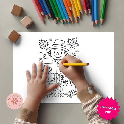 Coloring page with a scarecrow, pumpkins, and leaves, with hands holding a yellow pencil and coloring the page.
