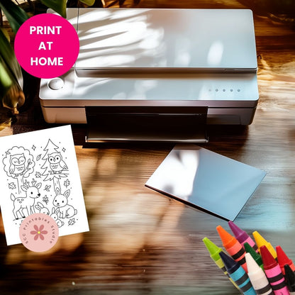 Printer on a table with coloring book pages and crayons, featuring 'Print at Home' text.