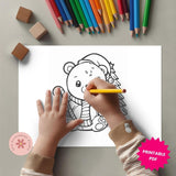 Child coloring a bear drawing with colored pencils on a light gray background