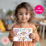 Child holding a Mother's Day card with colorful graphics and a green pencil, in a home setting.