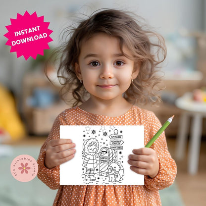 Child holding a coloring page with a green pencil, in a casual indoor setting.